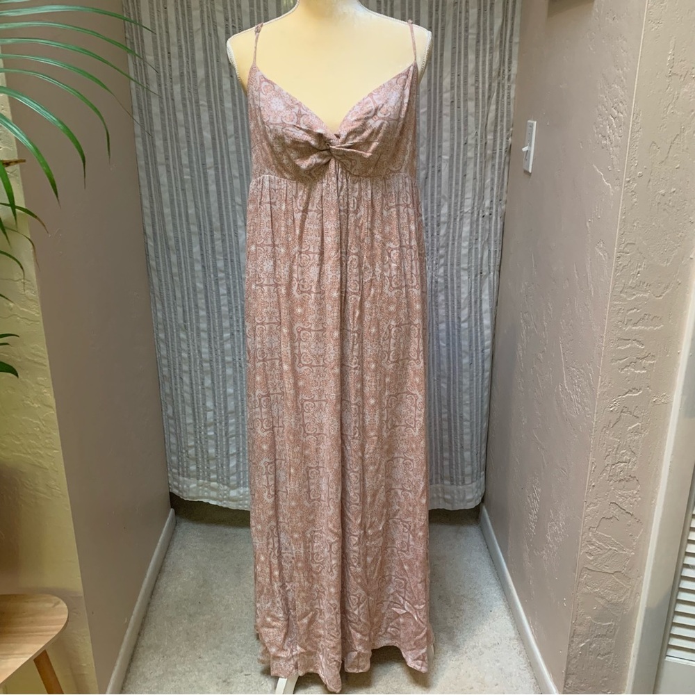 Romantic dusty pink, empire waist, bow tie back. Maxi